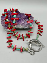 Load image into Gallery viewer, This uniquely designed Southwestern Style necklace is a mesmerizing blend of large bamboo red coral beads as well as turquoise and gold glass beads. The finishing touch is a beautiful large serpent toggle clasp.    Measurements:   Necklace is 25 1/2 " in length 
