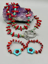 Load image into Gallery viewer, These Bamboo coral red stone chip earrings feature a subtle hoop design adorned with tiny turquoise, red, and gold glass beads. Completing the look is a turquoise flower pendant with a dark red glass bead in the center.  Measurements: 2" length 
