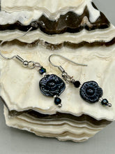 Load image into Gallery viewer, These gorgeous Black Metallic Floral Glass Beaded Earrings are the perfect accessory for any outfit. Shabby Boho Chic and nature-inspired, these earrings give you the style versatility you need. Dress these up or down depending on the occasion - you can&#39;t go wrong.  Measurements: 1 1/4 ” in length
