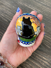 Load image into Gallery viewer, Cat Lovers Cemetery Cat and Skull Art, Hand Painted Ceramic Sugar Skull, Dia De Los Muertos Calavera, Mini Day of the Dead Cat Ceramic Skull
