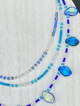 Load image into Gallery viewer, This exquisite Winter Frost Nature Inspired Jewelry has all your style needs covered. A detailed, glass beaded necklace featuring an array of blues, silver and gold tones adorns your neck to add a touch of elegance to any look. Effortlessly dress it up or down to complement any ensemble.  Measurements:  Necklace is 14” in length, can be adjusted up to 18"
