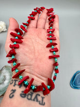 Load image into Gallery viewer, A distinctive Southwestern Style necklace featuring an alluring blend of large red coral and turquoise glass beads, gold accents, and an eye-catching cascade of vibrant color.    Measurements:    Necklace is 19 " in length adjustable to 20"
