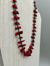 Load image into Gallery viewer, A distinctive Southwestern Style necklace featuring an alluring blend of large red coral and turquoise glass beads, gold accents, and an eye-catching cascade of vibrant color.    Measurements:    Necklace is 19 " in length adjustable to 20"
