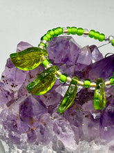 Load image into Gallery viewer, Light green glass leaf beaded earrings are intricately designed, making them ideal for styling in all seasons. Measurements:  Earrings: 2 1/4&quot; length
