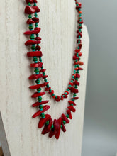 Load image into Gallery viewer, This eye-catching Southwestern Style necklace features two strands of alternating red coral and turquoise-tone glass beads, including both petite and larger sizes.    Measurements:    Necklace is 17" in length adjustable to 19"
