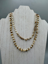 Load image into Gallery viewer, This natural bamboo, bone, and gold glass beaded necklace is the perfect piece to add versatility to any outfit. The neutral colors blend easily with any look and will give your outfit an unforgettable look. Measurements:   Necklace: 15&quot; - can be adjusted up to 16&quot;
