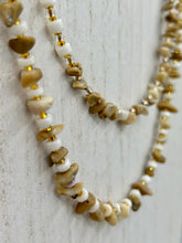 Load image into Gallery viewer, This natural bamboo, bone, and gold glass beaded necklace is the perfect piece to add versatility to any outfit. The neutral colors blend easily with any look and will give your outfit an unforgettable look. Measurements:   Necklace: 15&quot; - can be adjusted up to 16&quot;

