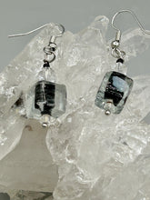 Load image into Gallery viewer, This striking set of earrings features large square-shaped clear glass beads adorned with black-and-white designs. Neutral-hued stone beads lend a cool feel, making them both unique and versatile. Measurements: 1 1/4” in length
