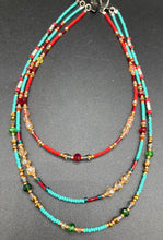 Load image into Gallery viewer, Vibrant And Enchanting Southwestern Style Jewelry. Colorful and bold three strand turquoise, bright and dark reds and greens, golds and yellows glass beads. 
