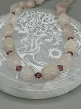 Load image into Gallery viewer, This Nature Lovers Necklace is a stunning addition to any outfit. Crafted from genuine rose quartz and light purple glass beads, the princess style necklace is secured with a hook-eye clasp for added security and style. Whether for everyday wear or a special occasion, this elegant accessory is sure to delight.  Measurements:  Necklace is 17” -  can be adjusted to 19&quot;
