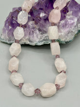 Load image into Gallery viewer, This Nature Lovers Necklace is a stunning addition to any outfit. Crafted from genuine rose quartz and light purple glass beads, the princess style necklace is secured with a hook-eye clasp for added security and style. Whether for everyday wear or a special occasion, this elegant accessory is sure to delight.  Measurements:  Necklace is 17” -  can be adjusted to 19&quot;
