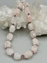 Load image into Gallery viewer, This Nature Lovers Necklace is a stunning addition to any outfit. Crafted from genuine rose quartz and light purple glass beads, the princess style necklace is secured with a hook-eye clasp for added security and style. Whether for everyday wear or a special occasion, this elegant accessory is sure to delight.  Measurements:  Necklace is 17” -  can be adjusted to 19&quot;
