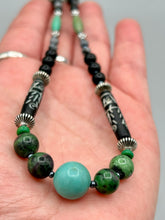 Load image into Gallery viewer, This necklace boasts a diverse selection of natural bead materials, including ruby zoisite, black and snowflake obsidian stones, plus turquoise magnesite, bone, glass and metal beads. This variety of sizes, shapes, textures and colors will make this necklace stand out.    Measurements:  Necklace - 23&quot; in length
