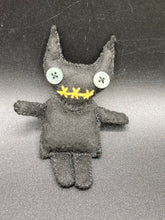 Load image into Gallery viewer, Black Devil Voodoo Doll has yellow mouth and cute little black horns of course, white buttons for eyes: 3 3/8&quot; in height 
