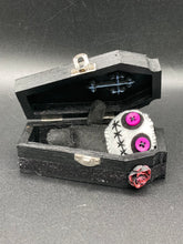 Load image into Gallery viewer, Creepy black and purple  Voodoo Doll stands tall at 3 3/8&quot; in height.  He’s all black like a shadow but has a round white head.  Bright purple buttons for eyes are perfect to see you better with.
