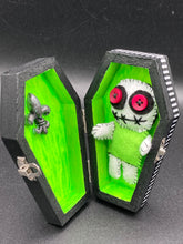 Load image into Gallery viewer, Mini Lime Green And White Voodoo Doll stands at 3 1/2&quot; in height.  Torso is lime green with arms, legs and head is all white.  He has dark red buttons for eyes.  Adorable but with a dash of creepy.
