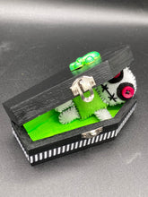 Load image into Gallery viewer, Mini Lime Green And White Voodoo Doll stands at 3 1/2&quot; in height.  Torso is lime green with arms, legs and head is all white.  He has dark red buttons for eyes.  Adorable but with a dash of creepy.
