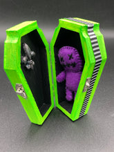 Load image into Gallery viewer, Purple Voodoo Doll stands at 3 3/4&quot; in height.  He has sowed mouth and eye shut so that make him creepy.
