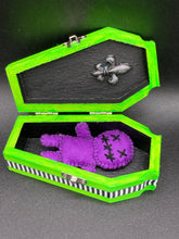 Load image into Gallery viewer, Purple Voodoo Doll stands at 3 3/4&quot; in height.  He has sowed mouth and eye shut so that make him creepy.
