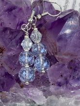 Load image into Gallery viewer, These gorgeous earrings boast three shimmering beads of round iridescent and silver glass.  Measurements: 1 1/4” in length

