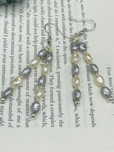 Load image into Gallery viewer, This piece is crafted with two strands of faux baroque pearls in white and gray, as well as silver glass beads. Measurements: 2” in length 
