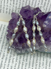 Load image into Gallery viewer, This piece is crafted with two strands of faux baroque pearls in white and gray, as well as silver glass beads. Measurements: 2” in length 
