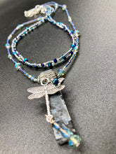 Load image into Gallery viewer, This stunning rectangular-shaped Black Labradorite Stone necklace features a wire-wrapped dragonfly pendant, completed with intricate glass bead detailing. Perfect for a summer night, it will make a bold statement.  Measurements: Necklace is 16” adjustable up to 18&quot;
