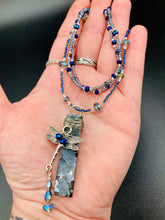 Load image into Gallery viewer, This stunning rectangular-shaped Black Labradorite Stone necklace features a wire-wrapped dragonfly pendant, completed with intricate glass bead detailing. Perfect for a summer night, it will make a bold statement.  Measurements: Necklace is 16” adjustable up to 18&quot;
