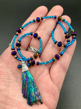 Load image into Gallery viewer, Rainbow Kyanite Wired Stone With Multi-Color Glass Beads Necklace. I used a combination of deep purples, turquoise blues, and golds to really capture the essence of this celestial galaxy stone. This beautiful necklace and rainbow kyanite pendant is a must have jewelry piece to add to your collection.  Measurements: Necklace is 16” adjustable up to 18&quot; in length - pendant is 2” Height
