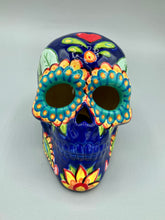 Load image into Gallery viewer, I wanted to create a skully that represented the eternal love for a special kitty cat in your life. Dark royal blue ceramic sugar skull with black cat silhouette is sitting admiring the sun going down. This Day Of The Dead ceramic skull art was created for the cat lovers who adore their sweet kitty. Measurements: H 4” x W 4” x D 5 1/2”
