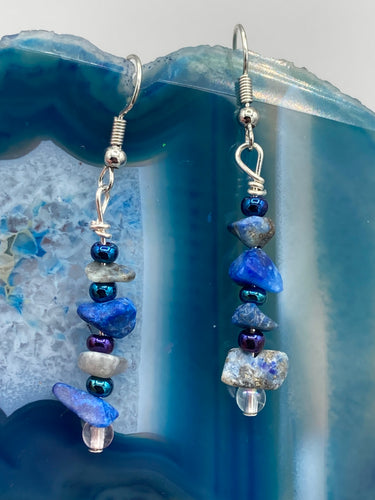 A single strand of lapis stone chips and multicolor glass beads compose these sophisticated earrings, perfect for bringing effortless nature-inspired style to a shabby chic, boho-chic, or hippie vibe ensemble. Measurements: 1 3/8” in length 
