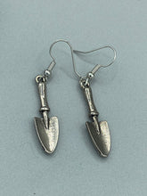 Load image into Gallery viewer, Gift the gardener in your life with these Garden Trowel Charm Earrings, a perfect piece of jewelry for garden lovers. The earrings feature a delicately crafted Trowel Tool Charm and are sure to make a statement. A memorable gift for any gardener!  Measurements: 1 1/2” in length
