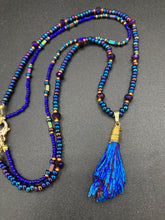 Load image into Gallery viewer, This structured royal blue kyanite stone pendant is 1 3/4” in length. The two accompanying strands of glass beads and rectangular hematite beads work together to bring out the vibrant colors of this celestial gemstone. In this combination, purples, blues, greens, and golds are juxtaposed for an eye-catching display.  Necklace is 15” in length, can be adjusted to 18&quot; in length 
