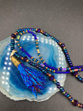 Load image into Gallery viewer, This structured royal blue kyanite stone pendant is 1 3/4” in length. The two accompanying strands of glass beads and rectangular hematite beads work together to bring out the vibrant colors of this celestial gemstone. In this combination, purples, blues, greens, and golds are juxtaposed for an eye-catching display.  Necklace is 15” in length, can be adjusted to 18&quot; in length 
