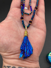 Load image into Gallery viewer, This structured royal blue kyanite stone pendant is 1 3/4” in length. The two accompanying strands of glass beads and rectangular hematite beads work together to bring out the vibrant colors of this celestial gemstone. In this combination, purples, blues, greens, and golds are juxtaposed for an eye-catching display.  Necklace is 15” in length, can be adjusted to 18&quot; in length 
