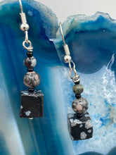 Load image into Gallery viewer, These Square Shape Snowflake Obsidian Beaded Earrings are perfect for achieving a boho chic and nature-inspired look. Featuring a cool tone stone set of beads, these earrings are large and perfectly versatile for a range of styles. Measurements: 1 1/4” in length
