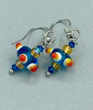 Load image into Gallery viewer, Vibrant color bumpy round lampworked glass bead set of earrings. Colorful teal, white, yellow, and bright orange festive piñata shaped bead.  This also reminds me of the shape of a virus. Either way, this is a super fun, unique, bold piece of jewelry, it&#39;s sure to make a statement piece.  Measurements: 1” in length
