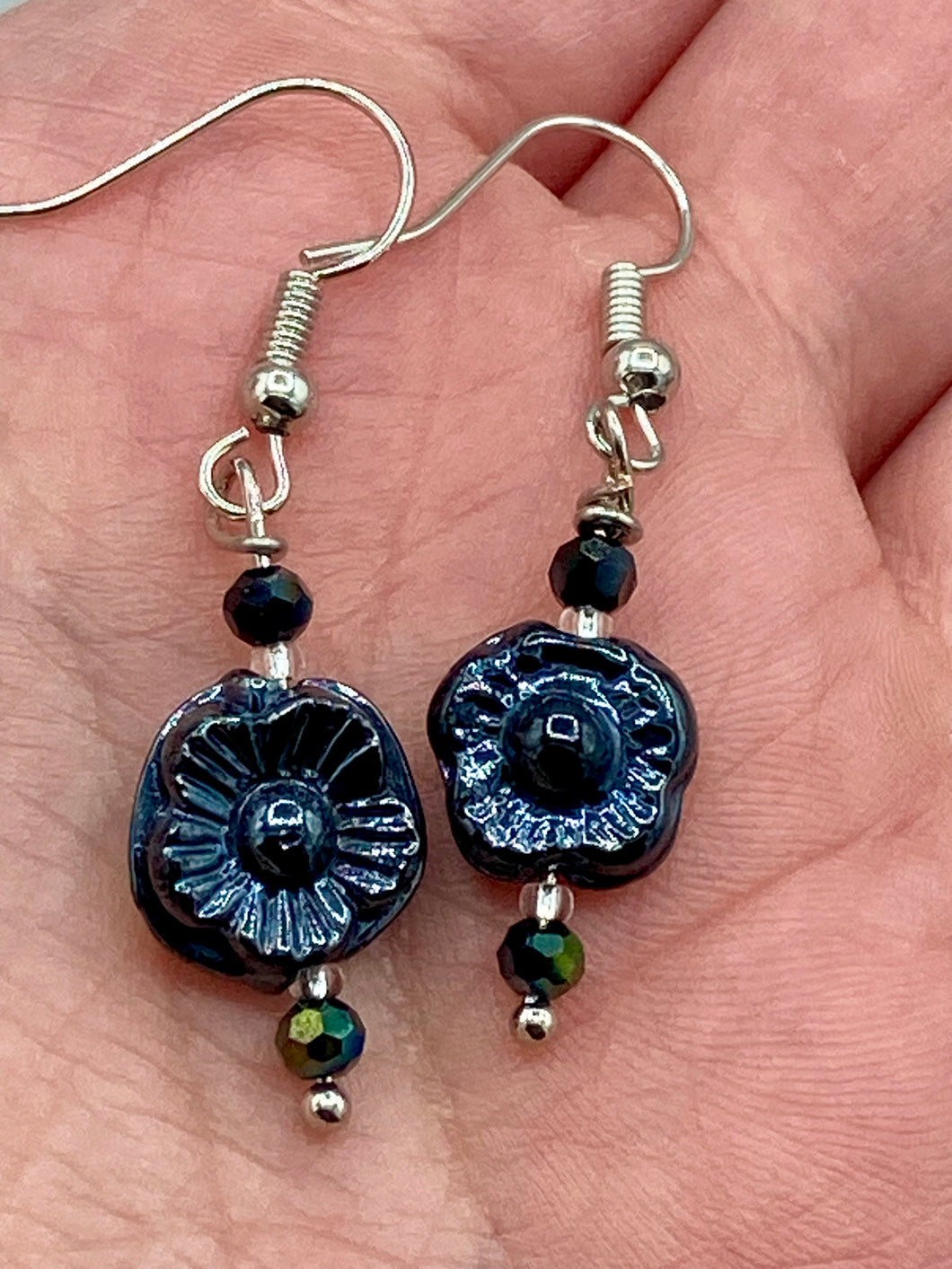 Black metallic floral glass beaded earrings are very versatile in style, you can dress these up or down, they will compliment any outfit.  Measurements: 1 1/4 ” in length