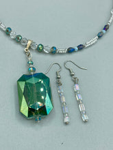 Load image into Gallery viewer, This pair of earrings features two strands of sparkling glass beads, in both rectangular and round shapes, with an iridescent sheen.  Measurements: 1 3/16” in length 
