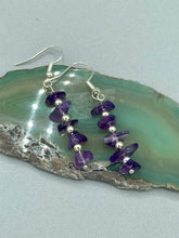 Load image into Gallery viewer, This single strand of beads is composed of natural amethyst stone chips and silver glass beads for a unique, bohemian look.  Measurements: 1 1/2 ” in length 
