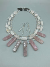 Load image into Gallery viewer, These elegant earrings are crafted with two delicate strands of iridescent rectangular and round glass beads.  Measurements: 1 3/4” in length  
