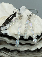 Load image into Gallery viewer, These elegant earrings are crafted with two delicate strands of iridescent rectangular and round glass beads.  Measurements: 1 3/4” in length  
