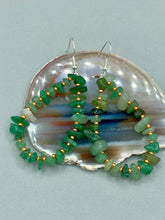 Load image into Gallery viewer, Elegant hoop earrings featuring natural green aventurine stone chips and gold-tinged glass beads. Measurements: 2&quot; length and 1 1/2” in width  
