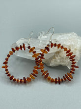 Load image into Gallery viewer, These hoop earrings feature natural amber stone chips and gold glass beads for an elegant, nature-inspired look.  Measurements: 2&quot; length and 2” in width   
