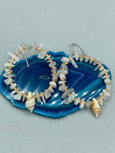 Load image into Gallery viewer, Natural white moon stone chip with white and gold glass beaded hoop earrings with super tiny natural conch shells.  Nature lovers, beach vibes, summer earring will compliment any look.   Measurements: 2&quot; length
