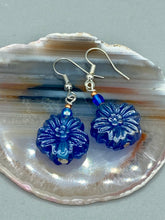 Load image into Gallery viewer, This Dark Blue Violet Floral Pressed Glass Beaded Earrings feature a captivating iridescent shimmer finish that adds beautiful detail. Measurements: 1 1/4&quot; length
