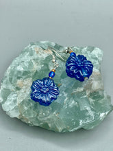 Load image into Gallery viewer, This Dark Blue Violet Floral Pressed Glass Beaded Earrings feature a captivating iridescent shimmer finish that adds beautiful detail. Measurements: 1 1/4&quot; length
