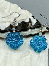 Load image into Gallery viewer, This light blue pressed glass floral bracelet is a sophisticated addition to any summer look. Its iridescent shimmer finish adds a classy touch to its intricate metal wire and lobster claw clasp. Perfect for any nature-inspired wardrobe. Measurements:  Bracelet: 8&quot; in length   Earrings: 1 1/4&quot; length
