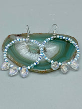 Load image into Gallery viewer, These Pressed Glass Leaf Beaded Hoop Earrings are perfect for a shabby chic, bohemian, or hippie vibe. The iridescent glass beads give off a soft and glamorous sparkle, while the clear glass charms have a shimmer finish with hints of gold, purple, blue and pink. They are the perfect nature-inspired accessory. Measurements: 2&quot; length
