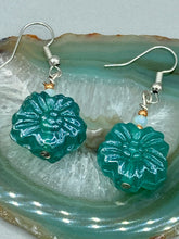 Load image into Gallery viewer, Upgrade your style with these sophisticated blue-green floral pressed glass earrings. Their iridescent glimmer finish adds a glamorous touch for any occasion. Crafted from lightweight glass, each design is both eye-catching and comfortable to wear. Measurements: 1 1/4&quot; length
